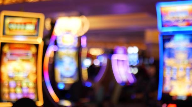 Mega Moolah slot game interface showing safari theme with animal symbols and spin controls